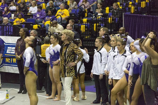 LSU coach D-D Breaux and the team watch Bulldog gymnasts during the Tigers 197.825-193.600 victory over the Georgia Bulldogs on Friday, Jan. 6, 2017 in the Pete Maravich Assembly Center.