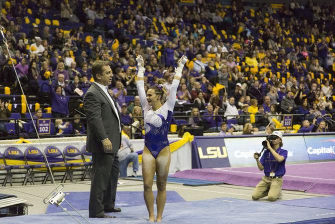 LSU senior gymnast Ashleigh Gnat celebrates a solid routine during the Tigers 197.825-193.600 victory over the Georgia Bulldogs on Friday, Jan. 6, 2017 in the Pete Maravich Assembly Center.