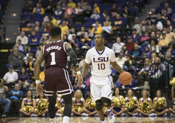 LSU junior guard Branden Jenkins (10) dribbles the ball while defended by Mississippi State freshman guard Lamar Peters (1) during the Tigers' 95-78 loss to the Bulldogs on Saturday, Jan. 07, 2017 in the Pete Maravich Assembly Center.