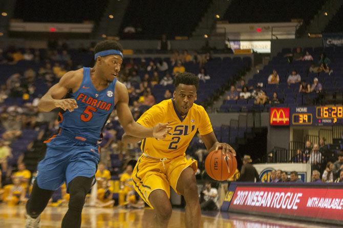 LSU sophomore guard Antonio Blakeney (2) dodges Florida sophomore guard KeVaughn Allen (5) during the Tigers' 106-71 loss to the Florida Gators on Wednesday, Jan. 25, 2017, in the PMAC.