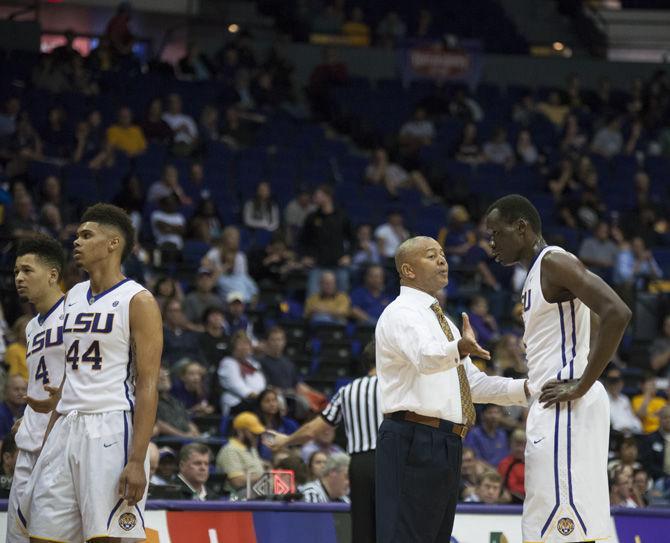 LSU men's basketball head coach Johnny Jones expresses frustration with junior forward Duop Reath (1) during the Tigers' 84-65 win against the University of Houston on Tuesday, Nov. 29, 2016 in the Pete Maravich Assembly Center.