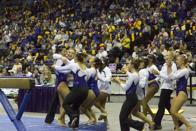 The Tigers celebrate during their 197.825-193.600 victory over the Georgia Bulldogs on Friday, Jan. 6, 2017 in the Pete Maravich Assembly Center.