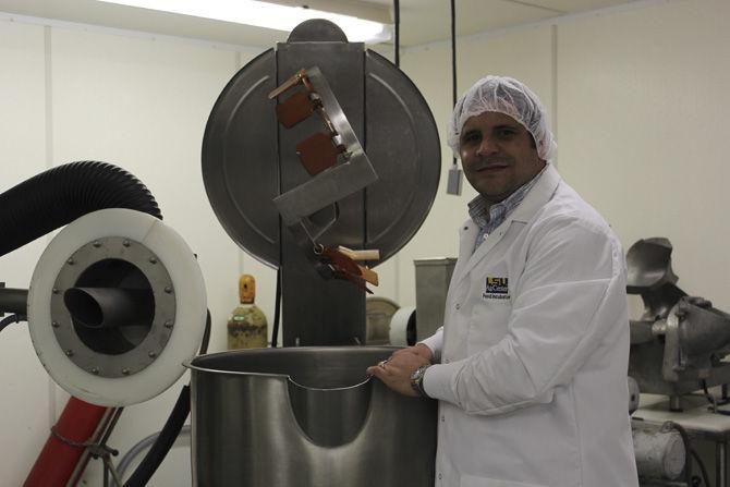 R&amp;D Food Scientist/Plant Manager, Marvin L. Moncada, Ph.D., stands next to a steam jacketed kettle on Wednesday, Jan. 11, 2017 in the LSU Ag Center Food Incubator.