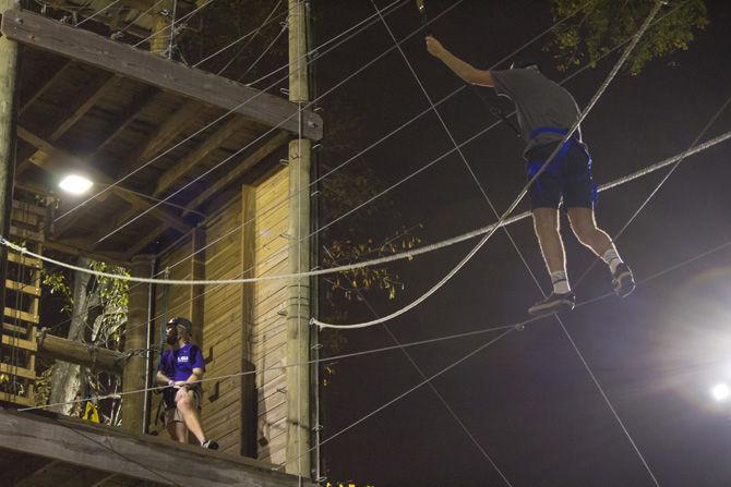 Students climb high during UREC Open Challenge Course