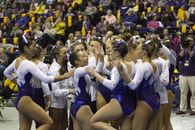 The Tigers celebrate during their 197.825-193.600 victory over the Georgia Bulldogs on Friday, Jan. 6, 2017 in the Pete Maravich Assembly Center.