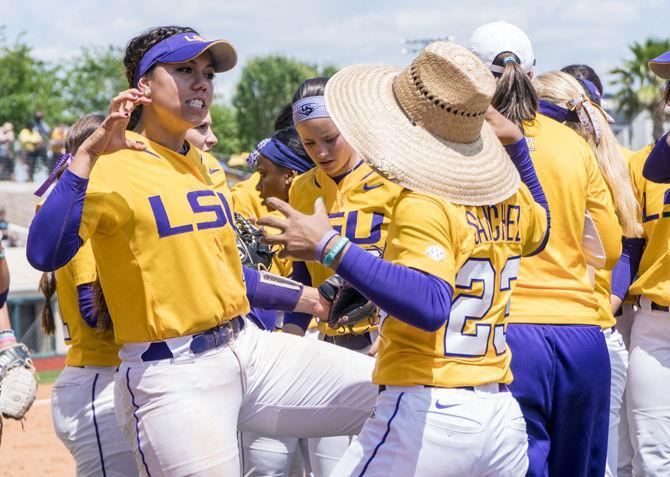 LSU junior infielder Sahvanna Jaquish (2) shakes hands with freshman infielder Shemiah Sanchez (23) during the Tigers' 2-0 victory against South Carolina on Sunday, Apr. 24, 2016 in Tiger Park.