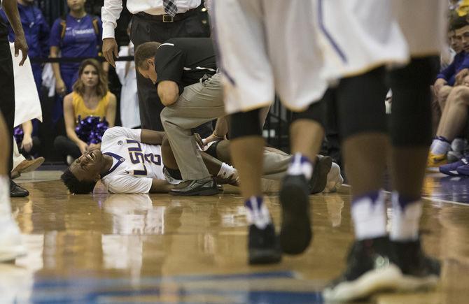 LSU sophomore guard Antonio Blakeney (2) lays on the ground after injuring his ankle during the Tigers' 81-66 loss to Alabama on Saturday, Jan. 14, 2017 in the PMAC.