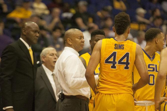 LSU freshman forward Wayde Sims (44) talks to LSU head coach Johnny Jones during the Tigers' 106-71 loss to the Florida Gators on Wednesday, Jan. 25, 2017, in the PMAC.