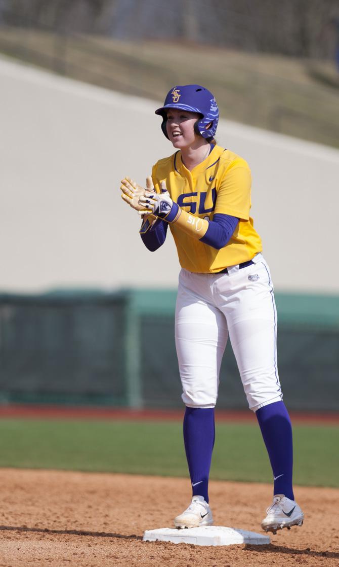 LSU freshman infielder Sydney Springfield (15) cheers on a teammate during the Tigers' 5-2 victory over OSU on Sunday, Feb. 12, 2017, at Tiger Park.