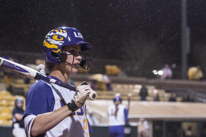 LSU junior Bailey Landry (26) stretches under the rain during game two of the Tigers' 1-0 victory against Longwood University on Tuesday, Mar. 8, 2016 in Tiger Park.