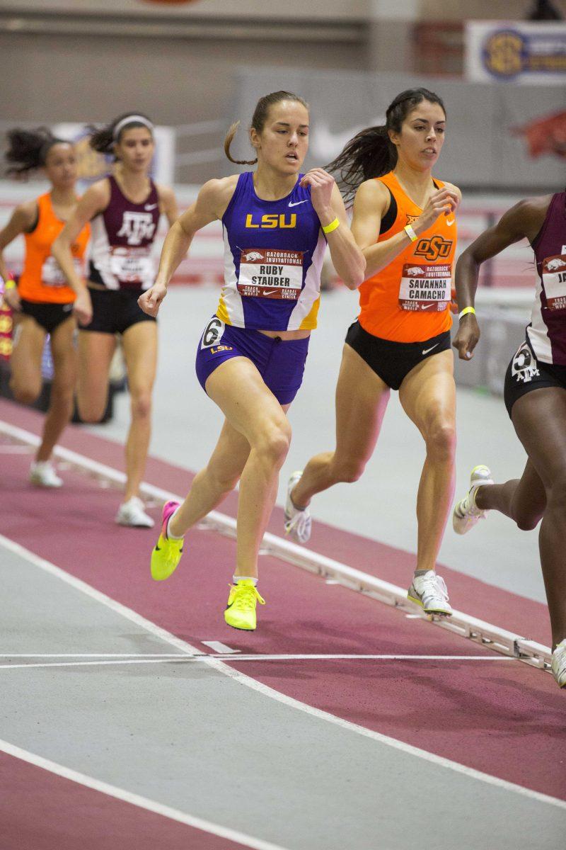 Freshman Ruby Stauber runs the track in the Razorback Invitational on January 28, 2017, in Fayetteville, Ark.