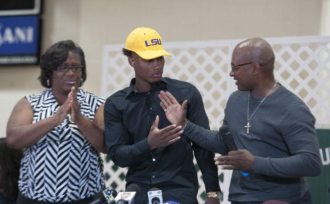 Third All-American safety Todd Harris celebrates his commitment to LSU with his mother Terri (left) and father Todd Sr. (right) on Wednesday, Feb. 1, 2017 at Plaquemine High School.