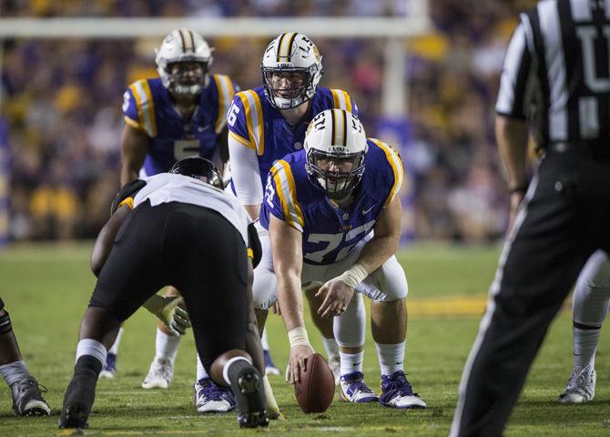 LSU junior center Andy Dodd (72) sets the ball on the line during the LSU 45-10 win against Southern Mississippi on Saturday Oct. 15, 2016, in Tiger Stadium.