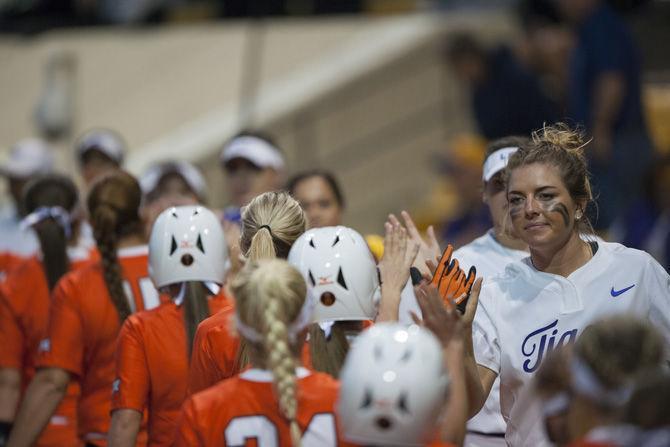 LSU softball team shakes hands with OSU after the Tigers&#8217; 14-2 victory over OSU on Friday, Feb. 10, 2017, in Tiger Park.