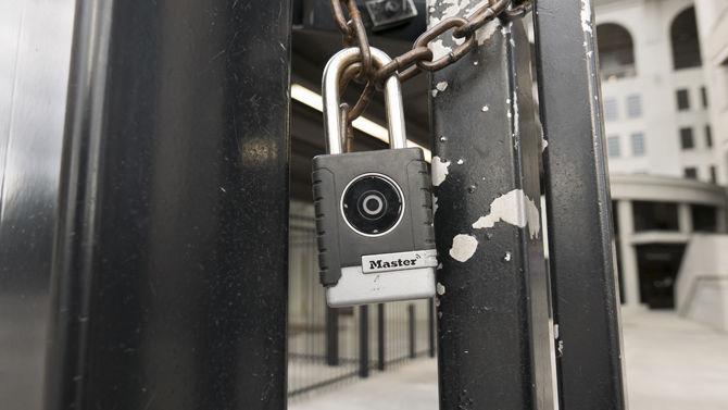 Padlocks seal the gates of Tiger Stadium on Jan. 10, 2017 as security heightens in response to the recent vandalizing.