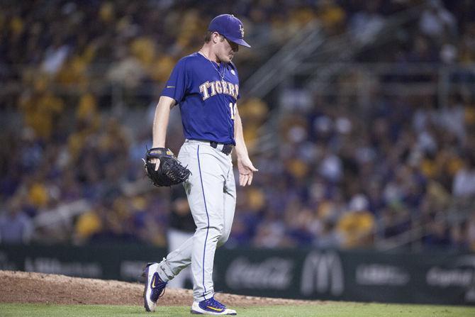 LSU junior pitcher Jared Poch&#233; (16) steps off the mound during the Tigers' 4-3 loss against Coastal Carolina in the Super Regional on Sunday, June, 13, 2016 at Alex Box Stadium.