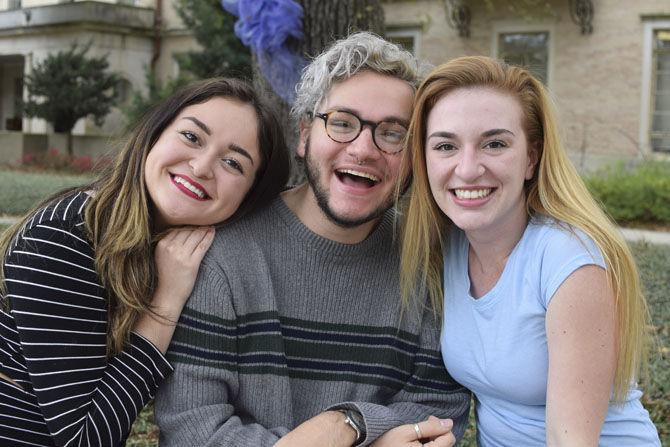 Mass communication senior Samantha Kennedy (left), theatre studies senior Alexander Charles Adams and mass communication junior Laine Farber (right) collaborate to create podcasts for Smash/Cut on Tuesday, Feb. 14, 2017, outside Hodges Hall.