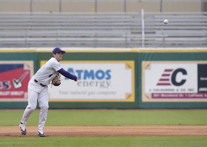 LSU freshman infielder Josh Smith (4) throws a ball to first base on Friday, Jan. 29, 2017, at Alex Box Stadium.