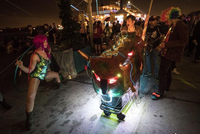 Festival goers enjoy the second and last day of Buku Music + Art Project on Saturday, Mar. 12, 2016 at Mardi Gras World in New Orleans.