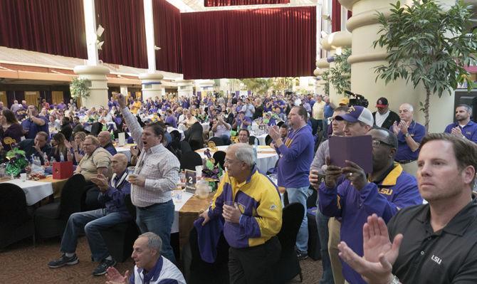 Tiger fans applaud the 2017 coaching staff at Belle of Baton Rouge Casino &amp; Hotel on Feb. 1, 2017.