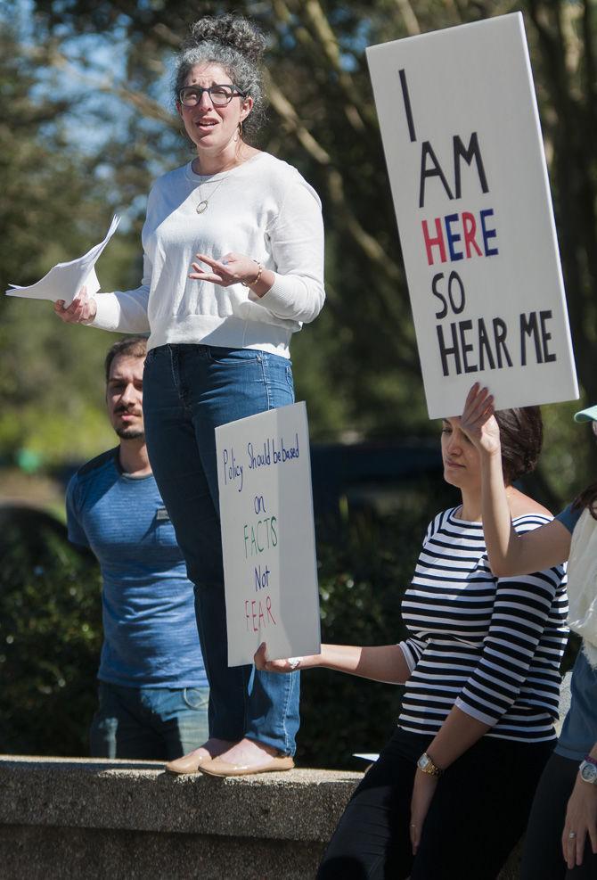 LSU Paul M. Hebert Law Center assistant professor of professional practice Lauren Aronson speaks in solidarity with protesters against the current immigration executive order on Thursday, Feb. 9, 2017, in front of the LSU Student Union Theater.