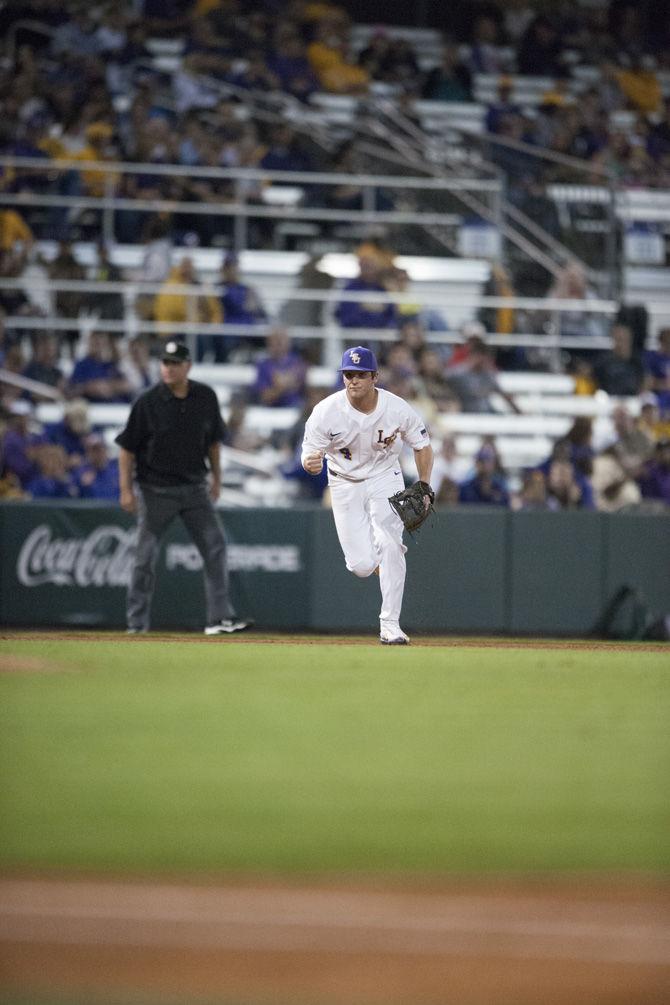 LSU freshman infielder Josh Smith (4) celebrates after a successful first inning on Friday, Feb. 24, 2017, during the Tigers 6-1 victory over Maryland at Alex Box Stadium.