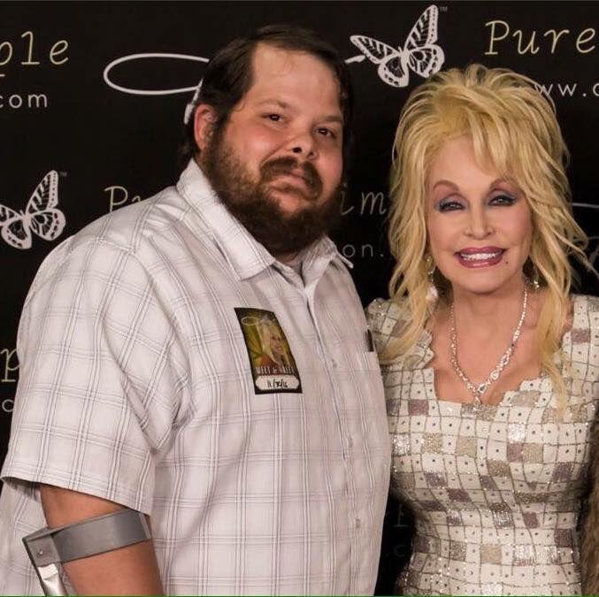 SigmaCon, to be held Feb. 11, will benefit student research and Dolly Parton's Imagination Library, a foundation to promote early childhood literacy. Timothy Leonard, Sigma Tau Delta's international student adviser is seen here with Dolly Parton.&#160;