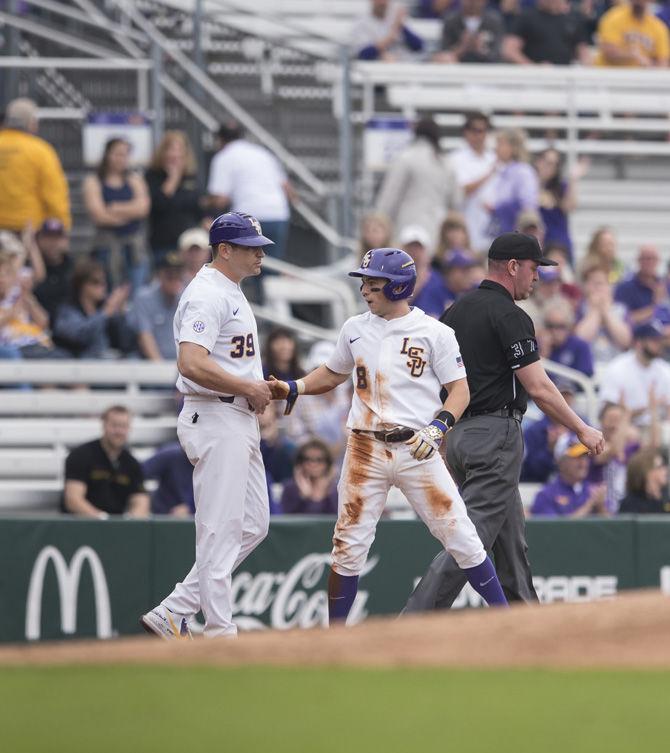 LSU senior infielder Cole Freeman (8) stands on third base during the Tigers' 9-0 win against Army on Saturday, Feb. 18, 2017 at Alex Box Stadium.