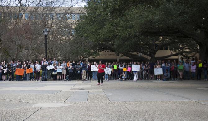 Members of the LSU community gather in the Quad to protest against President Trump's executive order regarding immigration.&#160;