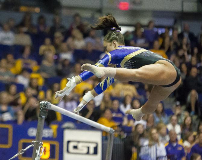 LSU all-around sophomore Lexie Priessman performs her uneven bar routine during the Tigers' 198.150-196.600 victory against Florida on Sunday, March 5, 2017, in the&#160;PMAC.