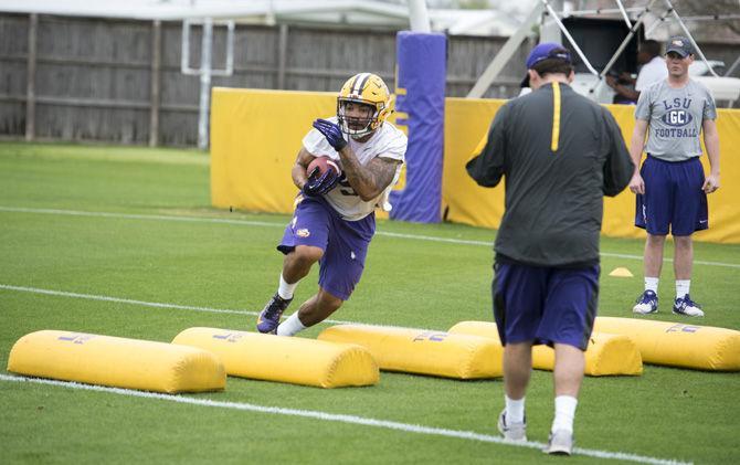 LSU junior running back Derrius Guice (5) participates in offensive drills during the first spring football practice on Saturday, March 11, 2017 at the Charles McClendon LSU football practice facility.