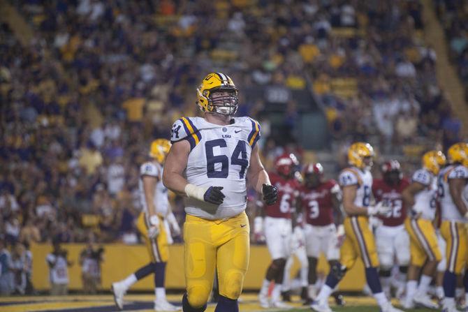 LSU sophomore center William Clapp (64) as he jogs off of the field on Saturday Sept. 10, 2016, during the tigers' 34-13 victory over Jacksonvile State University.