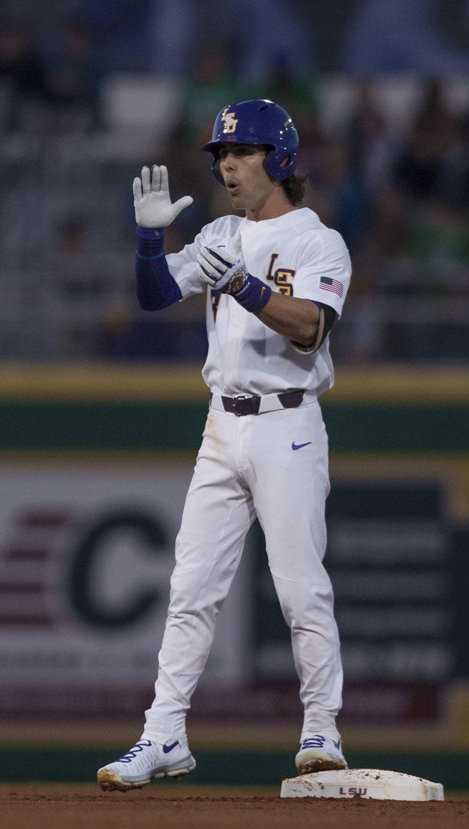 LSU senior infielder Kramer Robertson (3) celebrates during the Tigers' 22-9 victory over UGA on Friday, March 17, 2017, at Alex Box Stadium.