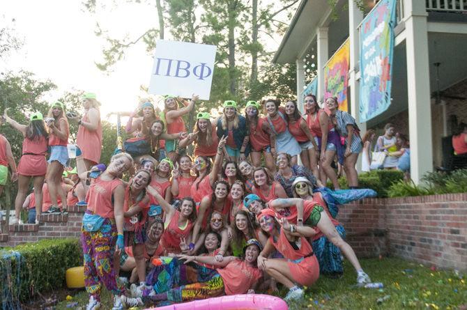 Members of Pi Beta Phi express their love for their sorority on Tuesday, Aug. 30, 2016, during Bid Day on Sorority Row.