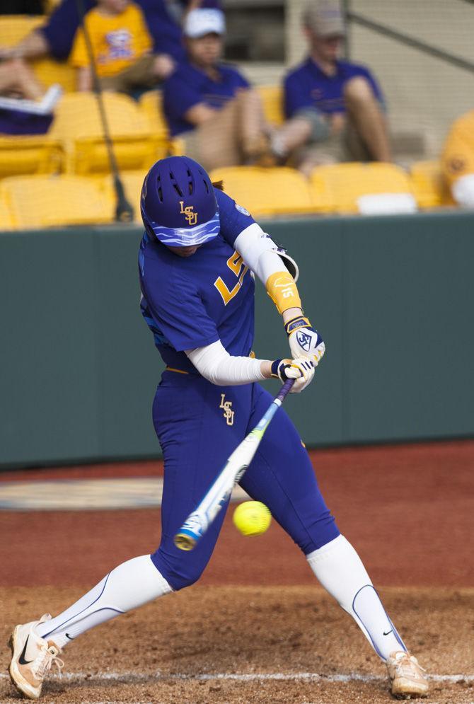 <p>LSU freshman infielder Sydney Springfield (15) hits the ball during the Tigers’ 10-1 victory over Georgia Southern University on Saturday, Feb. 18, 2017, at Tiger Park.</p>