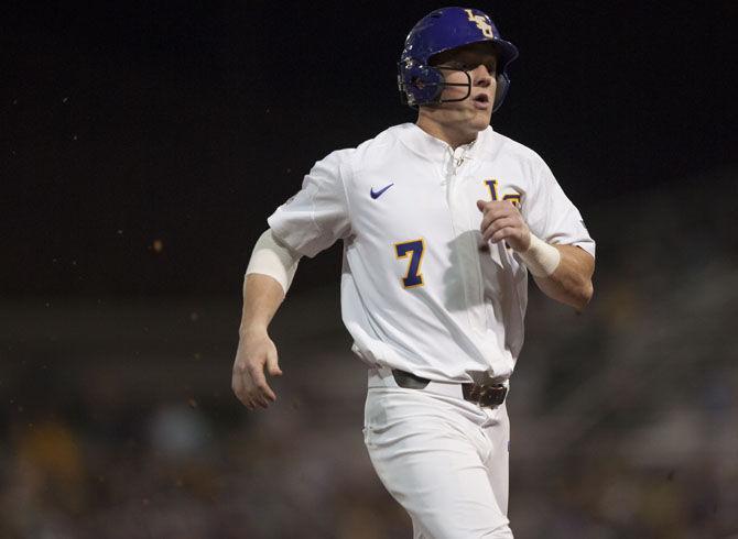 LSU junior infielder Greg Deichmann (7) runs to first base on Friday, March 17, 2017, during the Tigers' 22-9 victory over UGA at Alex Box Stadium.