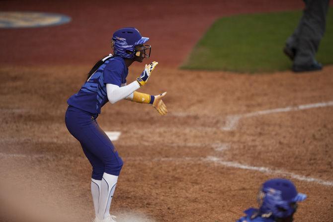 LSU freshman outfielder Aliyah Andrews (4) cheers for a teammate running from second after her home run during the Tigers&#8217; 4-3 victory over McNeese State University on Saturday, Feb. 11, 2017, in Tiger Park.