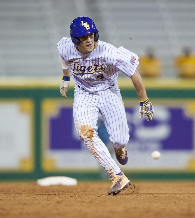 LSU freshman infielder Josh Smith (4) runs to third base on Tuesday, March 14, 2017, during the Tigers 13-0 victory over Louisiana College at Alex Box Stadium.