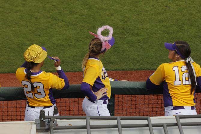 LSU players wear funny hats during the Tigers' 5-3 victory against Texas Tech on Sunday February 28, 2016 at Tiger Park.