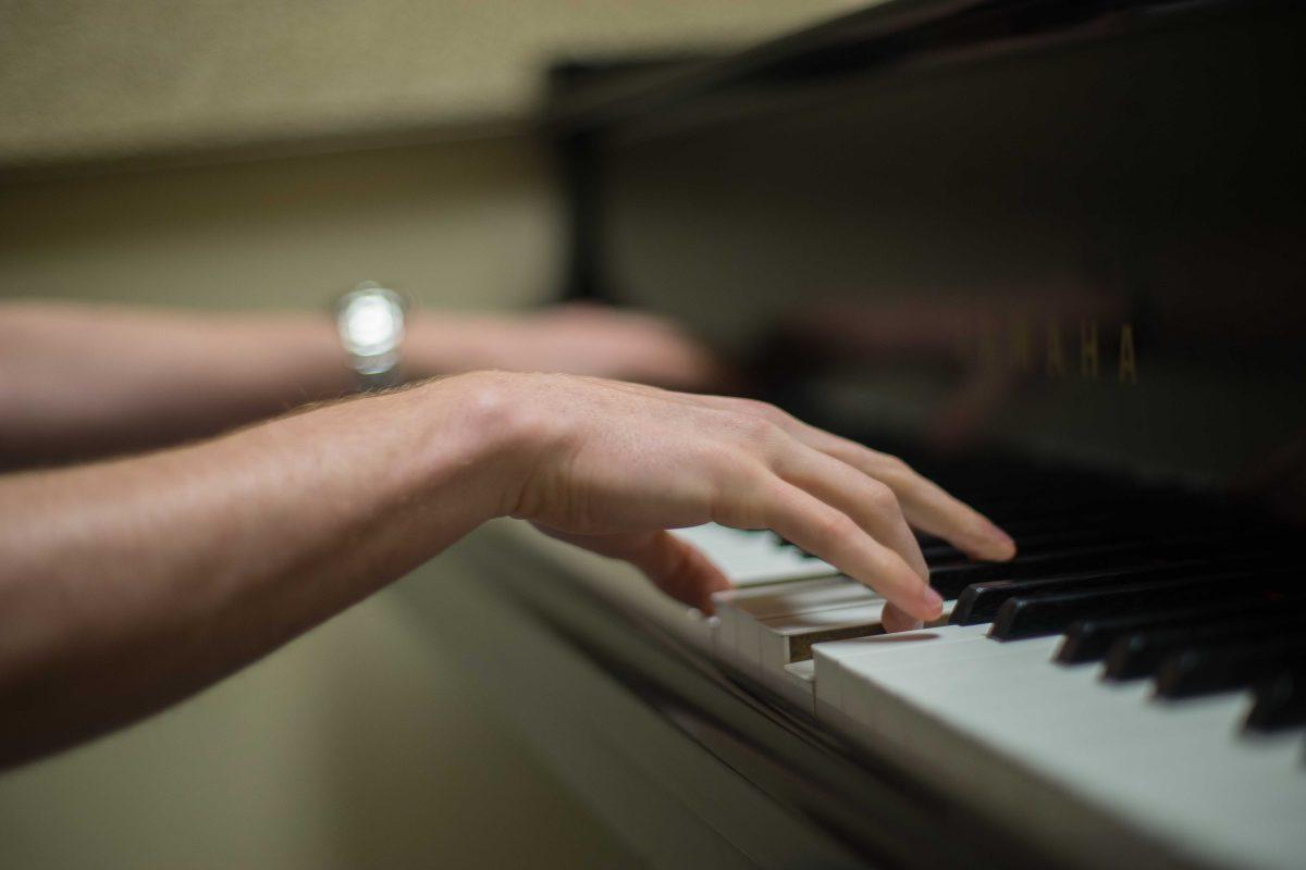 Michael McDowell playing the piano on Friday, March 10, 2017.