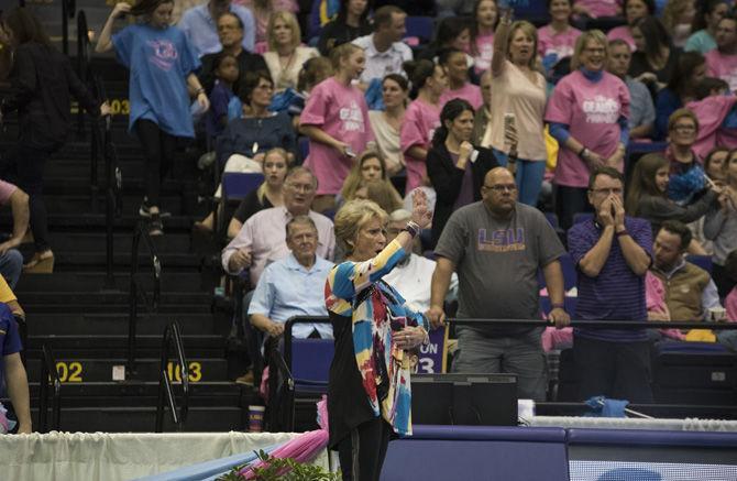 LSU Gymnastics Head Coach D-D Breaux signals during floor warm ups during the Tigers' 197.475 - 192.625 win over Texas Woman's University on Friday, Jan. 20, 2017 in the Pete Maravich Assembly Center.