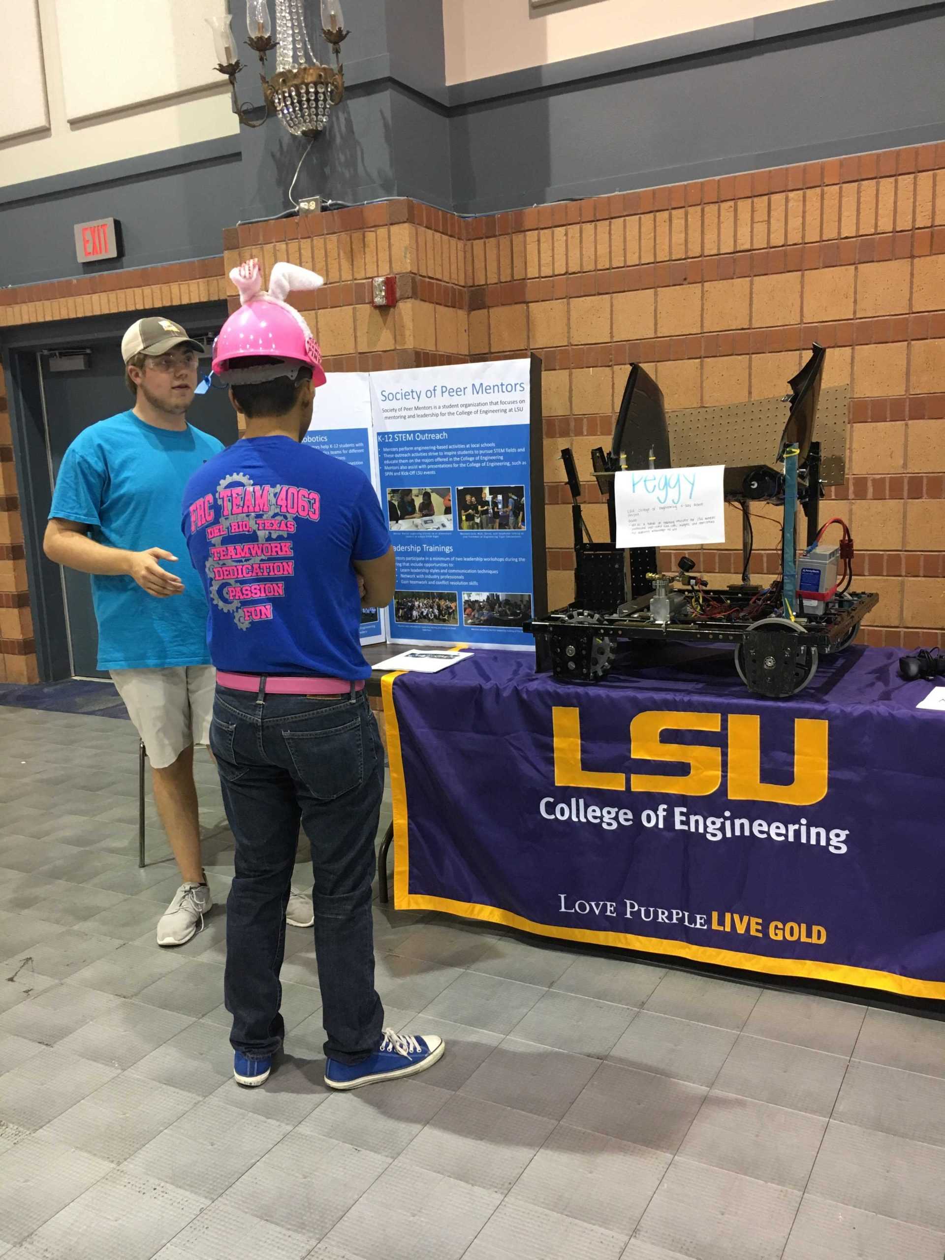 Society of Peer Mentors uses robotics to mentor local students