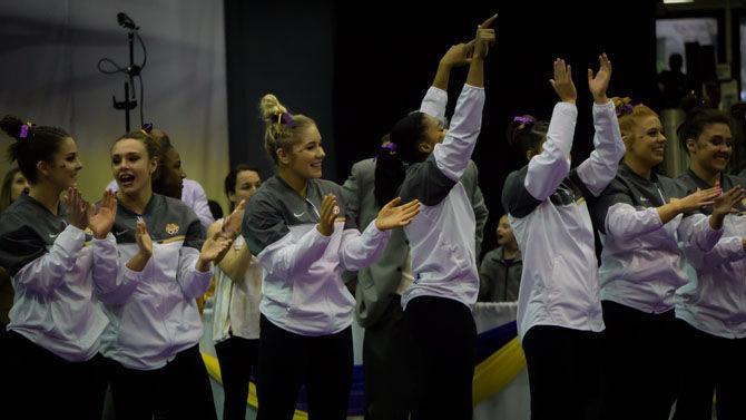 The LSU gymnastics team celebrates its win during the Tigers&#8217; 198.150 &#8211; 196.600 victory against Florida on Sunday,&#160;March 5, 2017, in the PMAC.