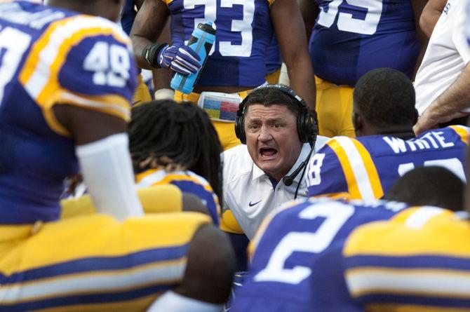 LSU defensive line coach Ed Orgeron gives a pep talk during a timeout Saturday, Sept. 3, 2015, during the Tigers' 44-22 victory over Eastern Michigan University in Tiger Stadium.