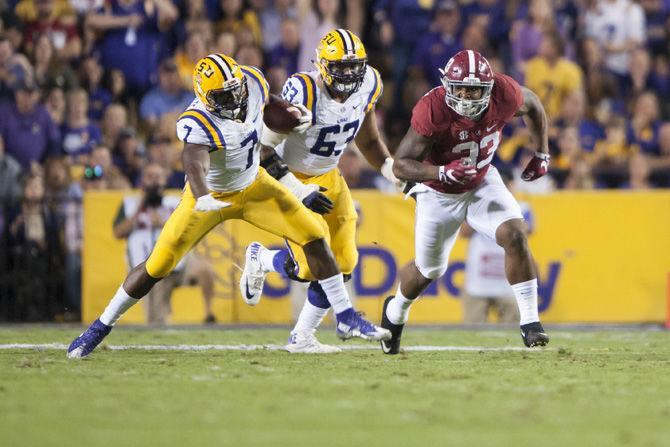 LSU junior running back Leonard Fournette (#7) runs the ball down the feild on Saturday, Nov. 5, 2016, during the Tigers 10-0 loss to Alabama in Tiger Stadium.