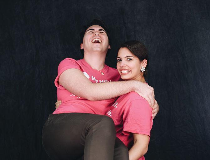 Jack Stallard and international studies senior Ivonne Guzman pose in their Planned Parenthood shirts.&#160;