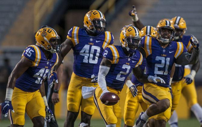 Junior cornerback Kevin Toliver (2) celebrates with his teammates after an interception during the Tigers' Spring Game at Tiger Stadium on April 22, 2017.