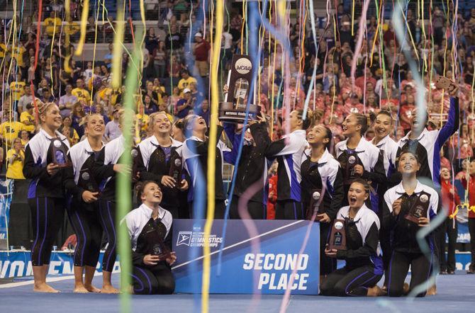 LSU gymnastics team celebrates during the Tigers' 197.7375 second place finish in the NCAA Super Six National Championship on Saturday, April 15, 2017 in the Chaifetz Arena in St. Louis, Missouri.