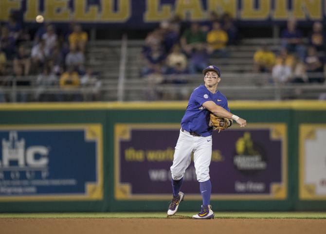 LSU senior infielder Cole Freeman (8) throws the ball to first base during the Tigers' 7-4 win against Texas A&amp;M on Friday, March 31, 2017 at Alex Box Stadium.