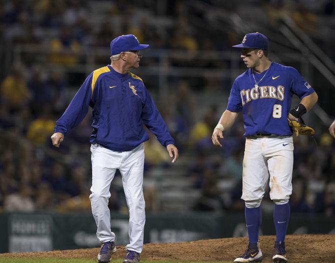 LSU coach Paul Mainieri speaks to senior infielder Cole Freeman (8) during the Tigers' 7-4 win against Texas A&amp;M on Friday, March 31, 2017 at Alex Box Stadium.